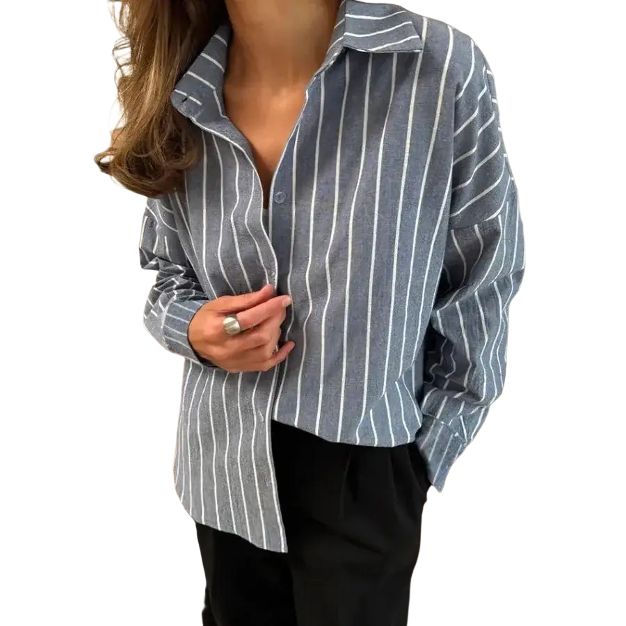 A classic striped shirt in blue and white vertical stripes, lightweight fabric, oversized fit for spring summer wear