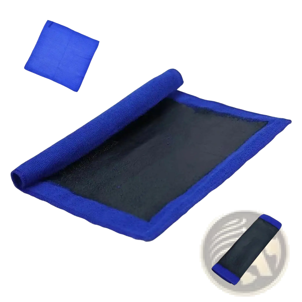 Blue clay bar towel with textured fabric and black mesh center partially rolled in compact carrying case for car detailing