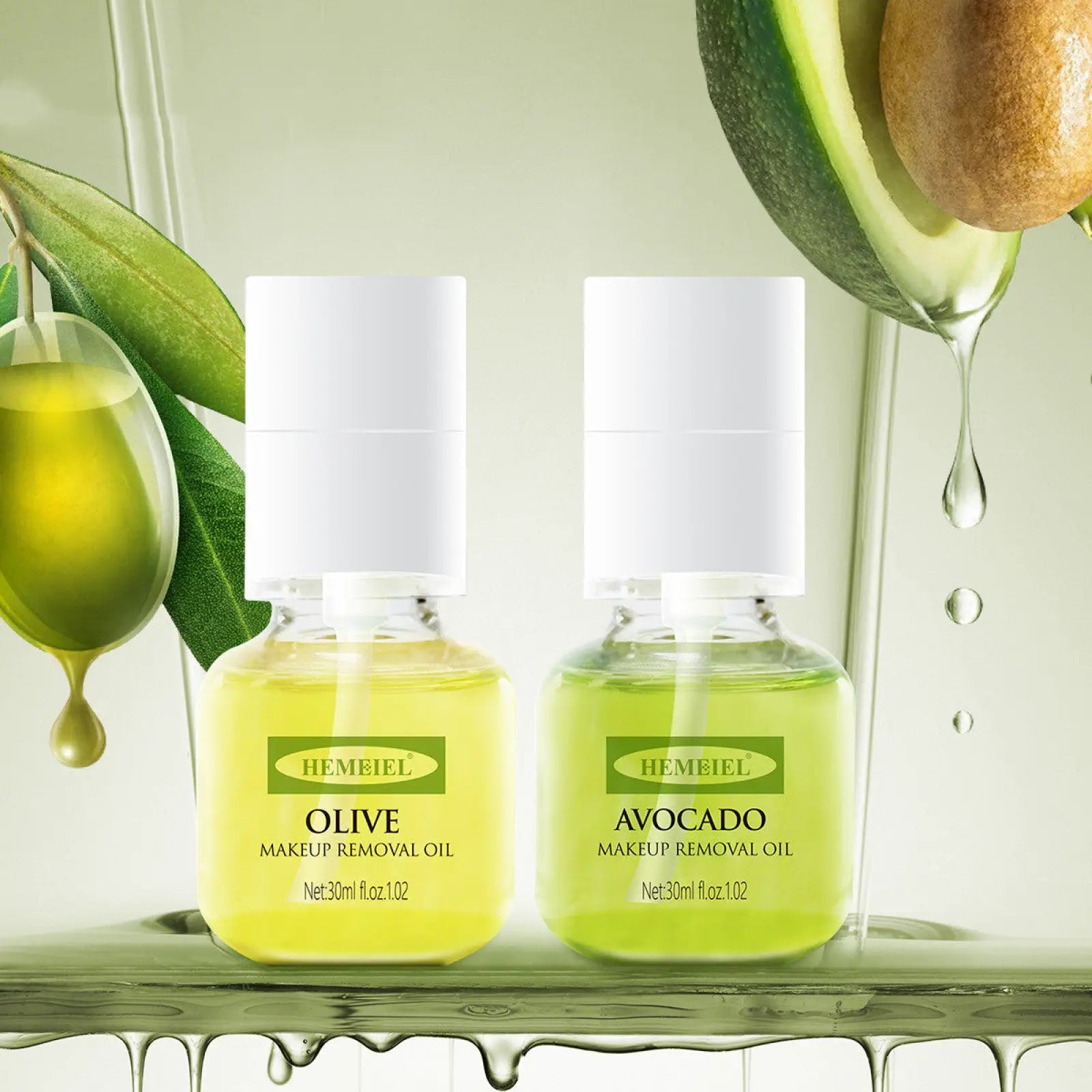 Two clear glass bottles with white caps containing yellow green hembei olive and avocado cleansing oil makeup removers 30ml