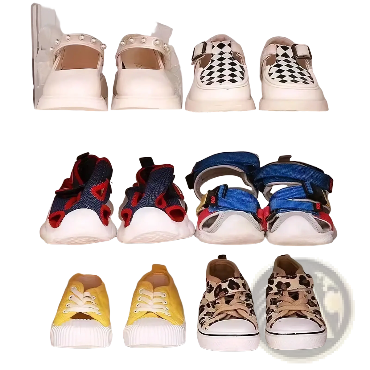 Clear acrylic baby shoe storage rack organizer neatly holds various colored and patterned children’s shoes