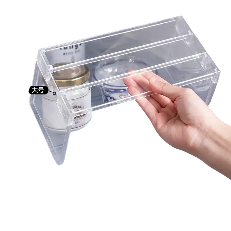 Clear expandable cabinet organizer and spice rack made of clear plastic with three compartments for refrigerator use