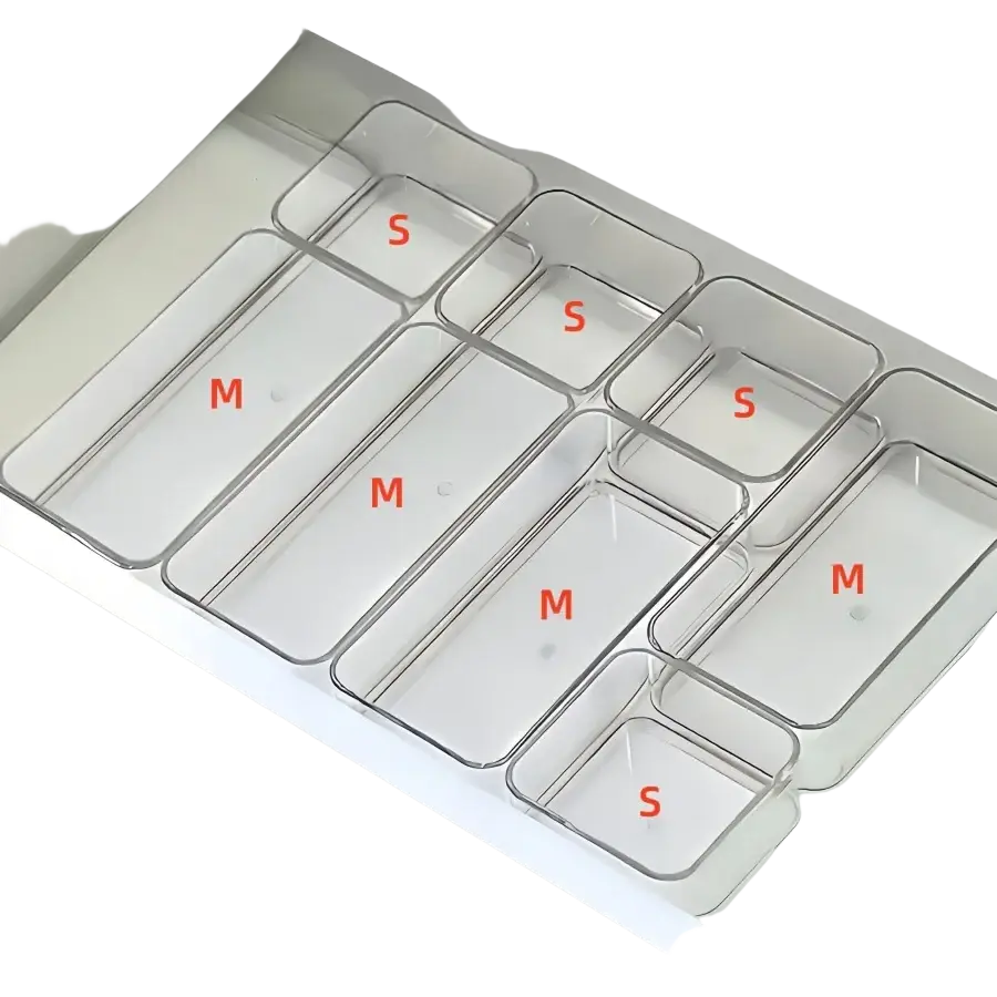 Set of eight clear plastic drawer organizers in small and medium sizes for organizing makeup and office supplies