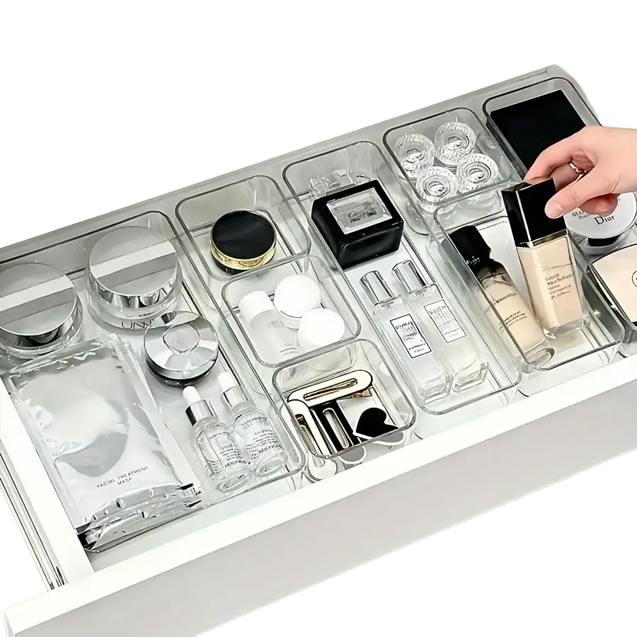 Clear plastic acrylic drawer organizer set with segmented compartments for organizing makeup and office supplies
