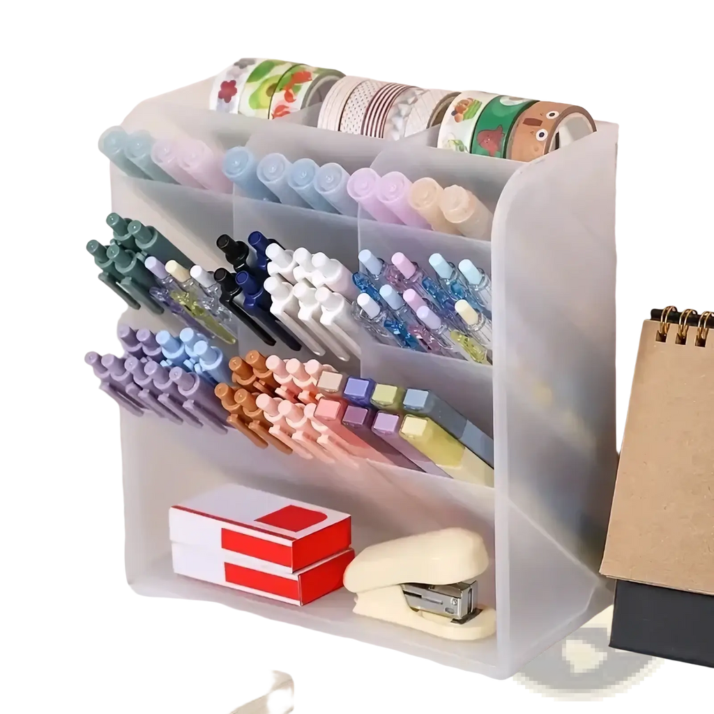 Clear plastic pen holder desktop stationery organizer with multiple compartments holding colorful pens pencils and washi tape rolls