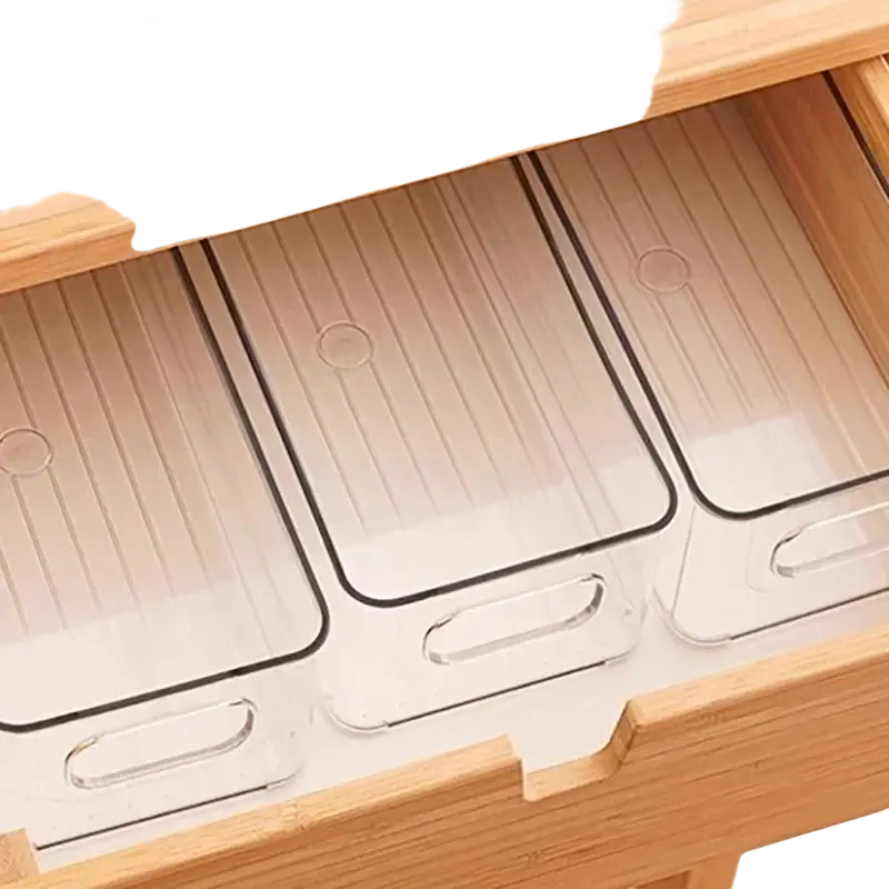 Clear plastic refrigerator organizer bins with black trim and handles neatly arranged in a wooden drawer