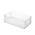 Clear plastic stackable tiered desk organizer with rectangular shape, integrated handles, and ribbed base for storage