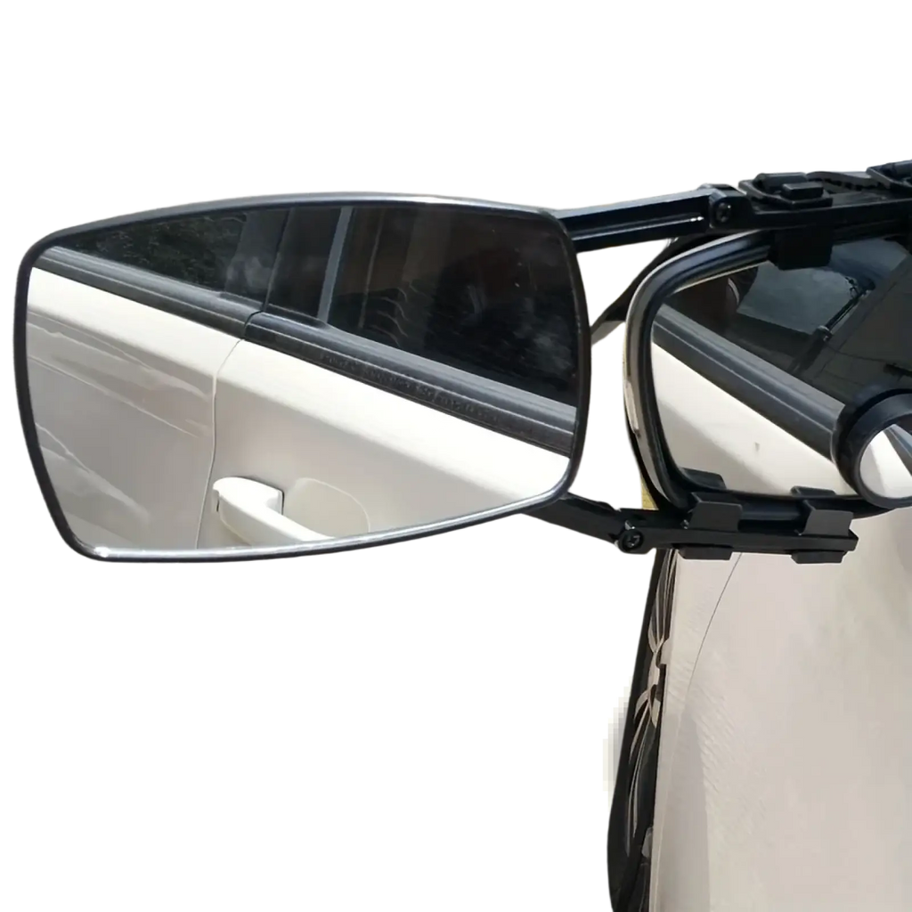 Black adjustable clip on towing mirror extension with rectangular reflective surface mounted on rv or truck side door