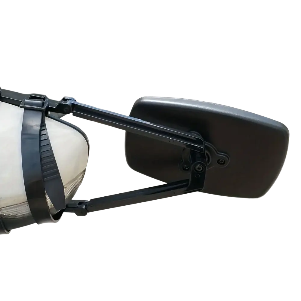 Black adjustable arm clip on towing mirror extension mounted on white rv and truck for enhanced visibility