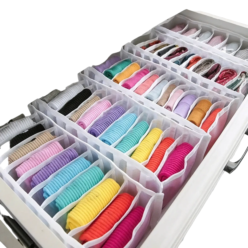 Colorful ribbed elastic hair ties organized in a white mesh closet drawer organizer for underwear and socks storage