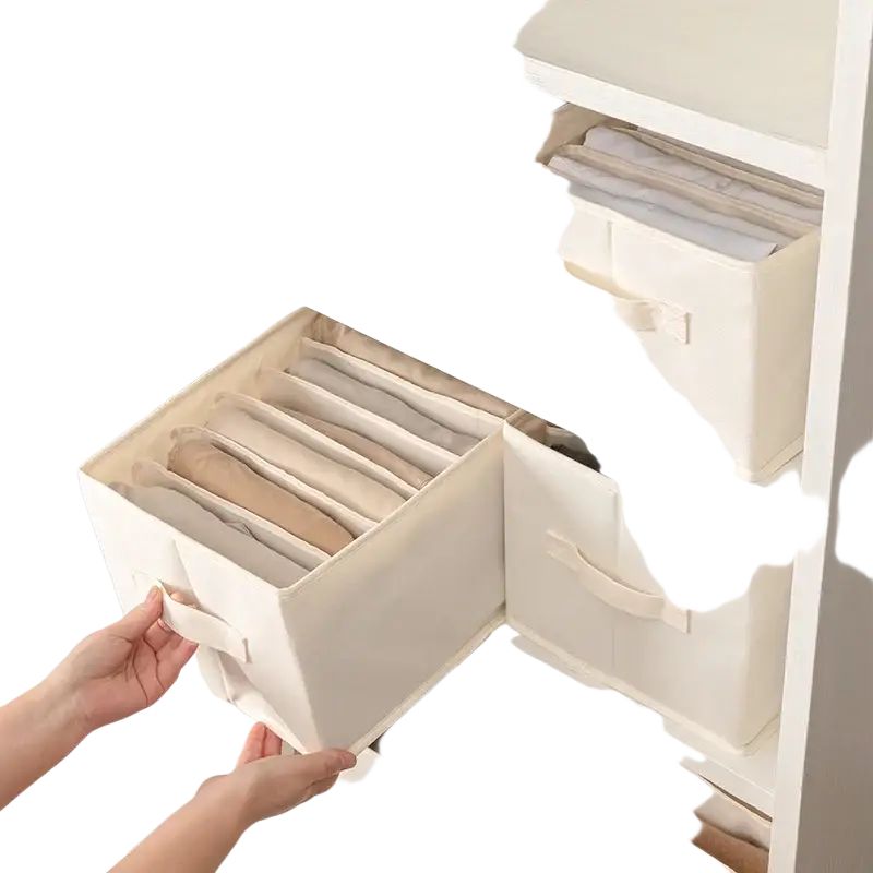 Off-white fabric clothes storage box with integrated handles and compartments for neatly storing folded clothing in wardrobe
