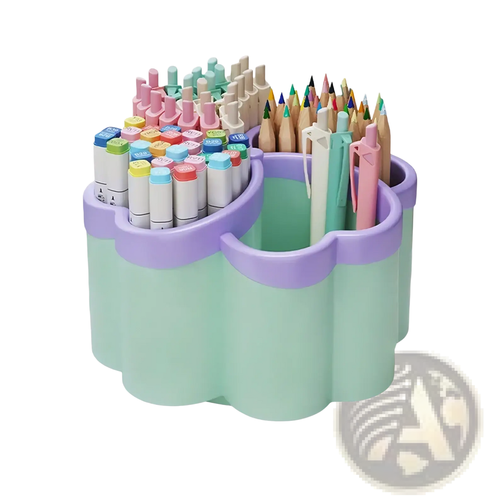 Pastel green and lavender cloud desk organizer made of plastic with four compartments holding colorful stationery items