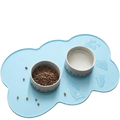 Light blue cloud silicone pet feeding mat with two white ceramic paw print bowls for small medium dogs and cats