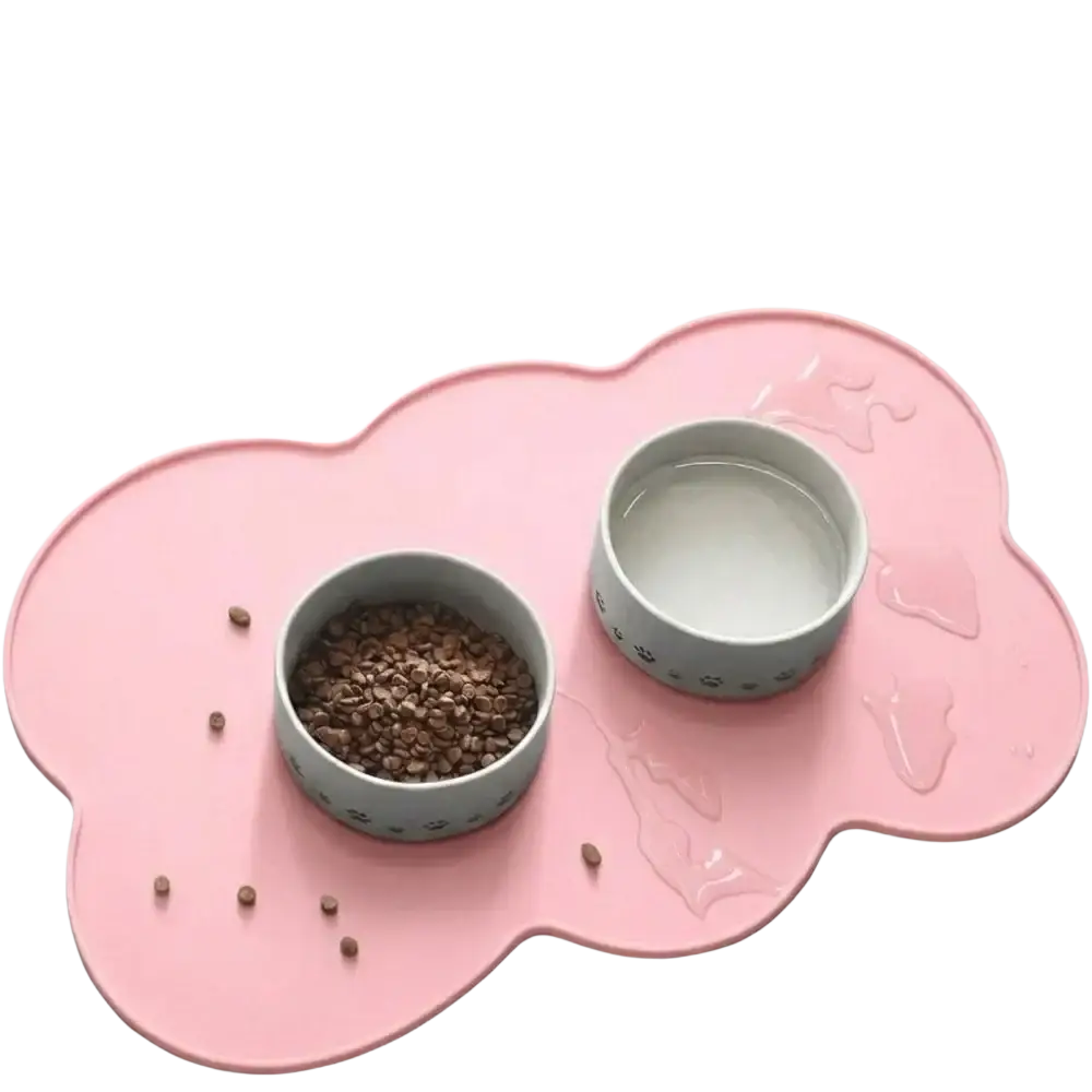 Pink cloud-shaped silicone pet feeding mat with two gray paw print bowls for kibble and water for small medium dogs cats