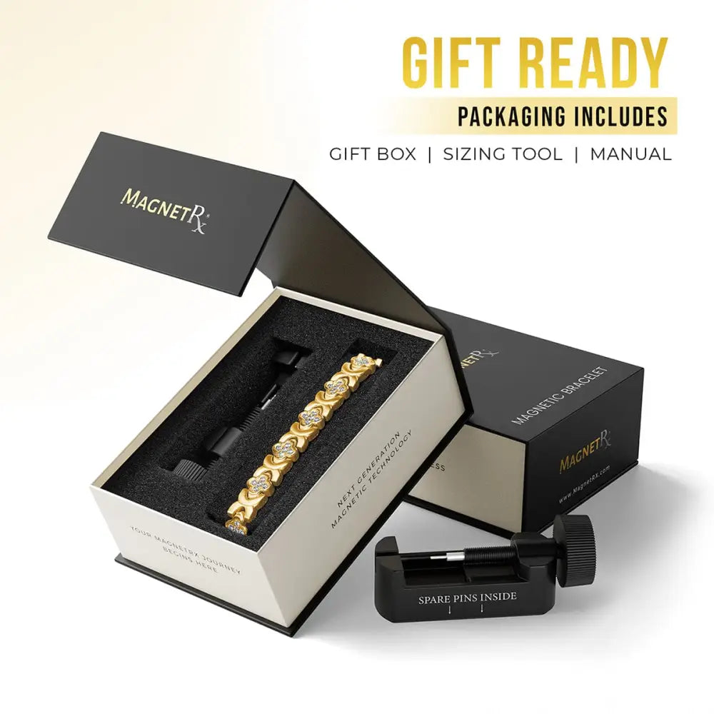 Gold crystal clover magnetic bracelet for women with gold-toned stones in a black and white gift box