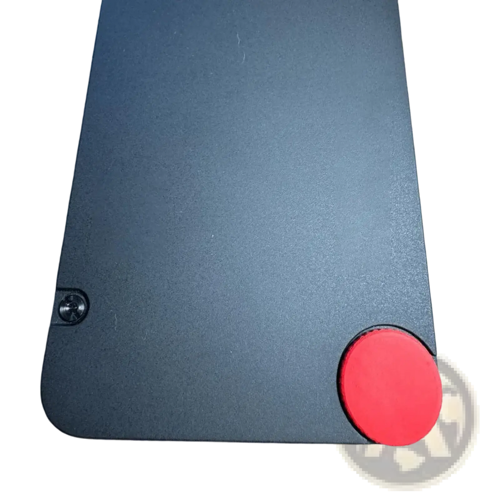 Black lenovo thinkpad laptop with red circular cmf phone 1 replacement screw cap custom accent on bottom right corner