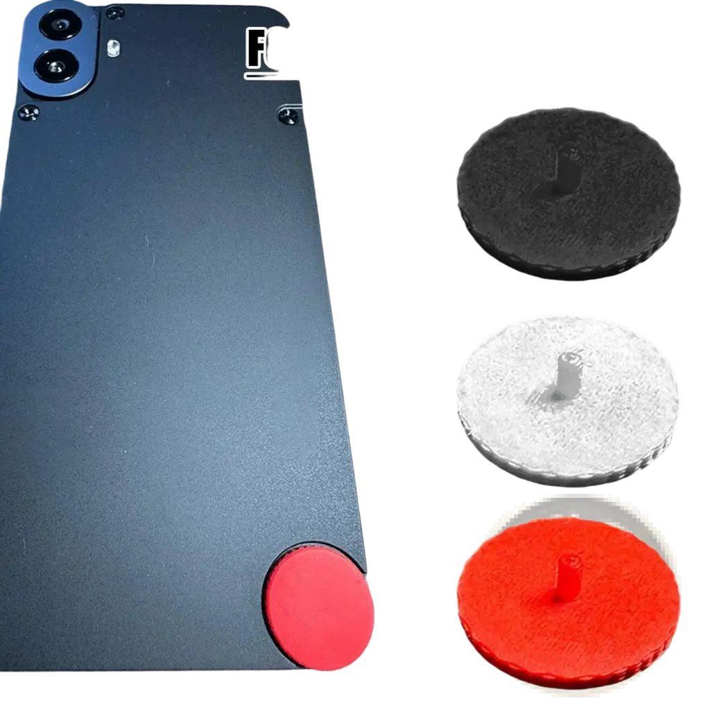 Black matte-finish back panel of cmf phone 1 with dual-camera module and red replacement screw cap custom accent