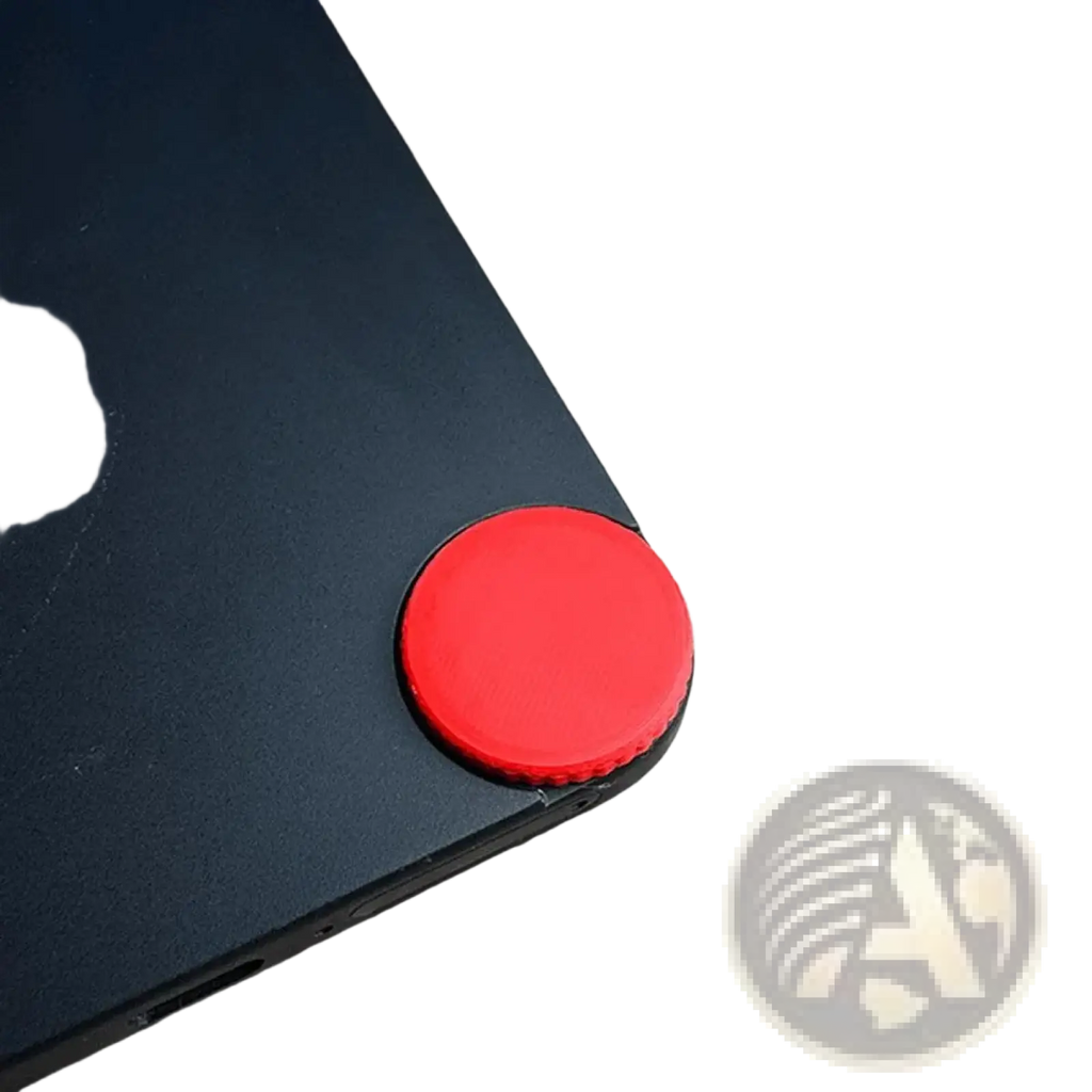 Red circular matte finish cmf phone 1 replacement screw cap custom accent designed to grip the edge of a black device