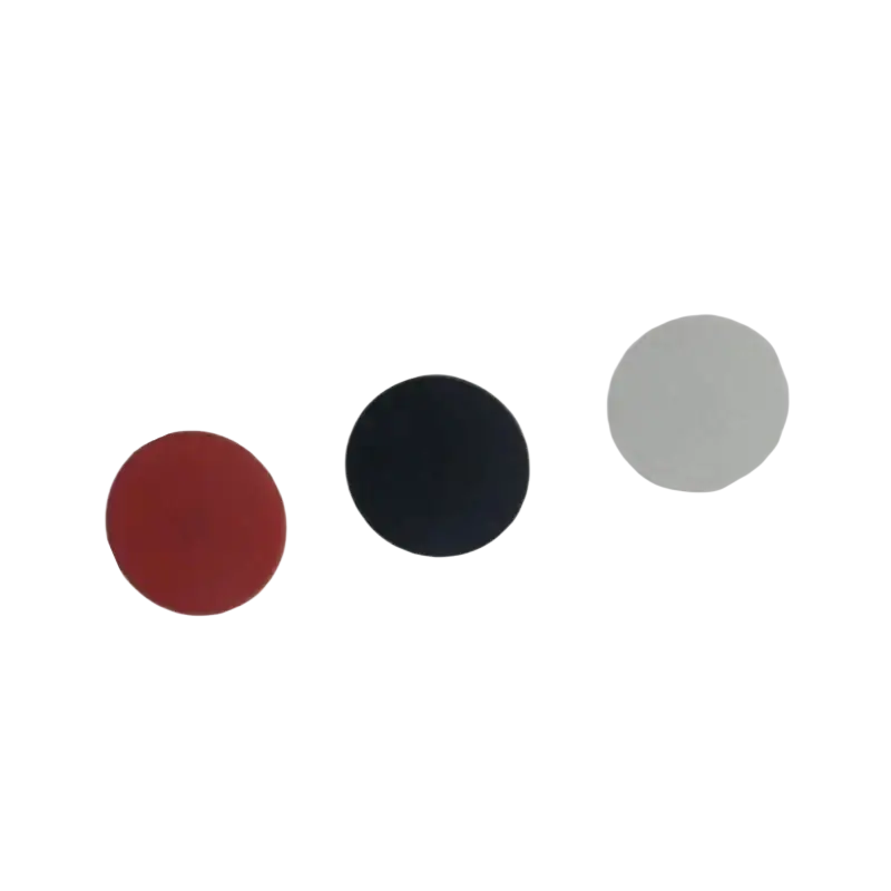 Three circular screw covers in red black and white for the cmf phone 2 pro a001 arranged horizontally on a plain background