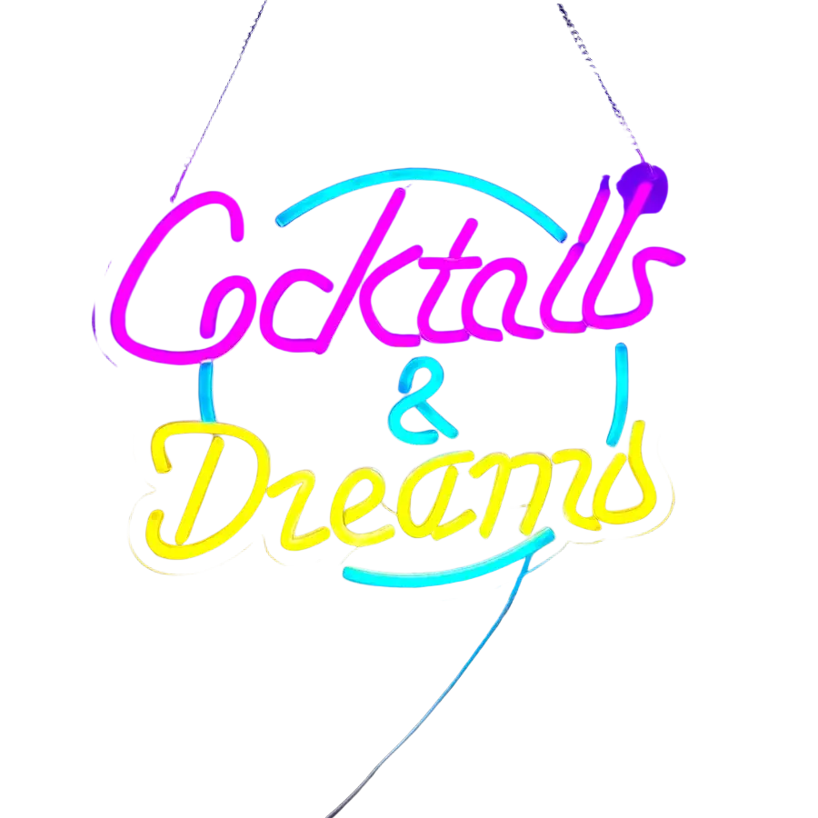 A vibrant neon sign displaying cocktails and dreams in pink yellow and blue cursive lettering for decor