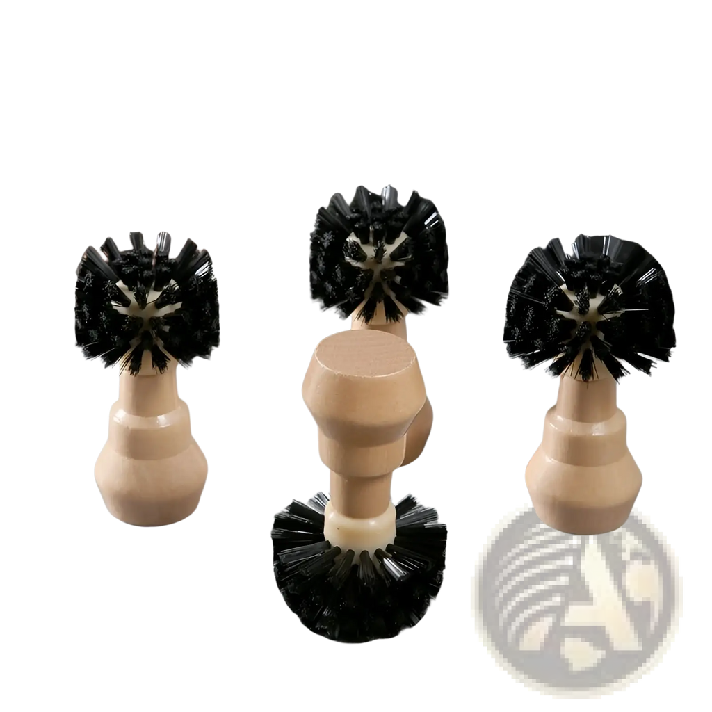 Set of four wooden-handled black-bristled coffee bean tampers with sturdy ergonomic design for espresso tools