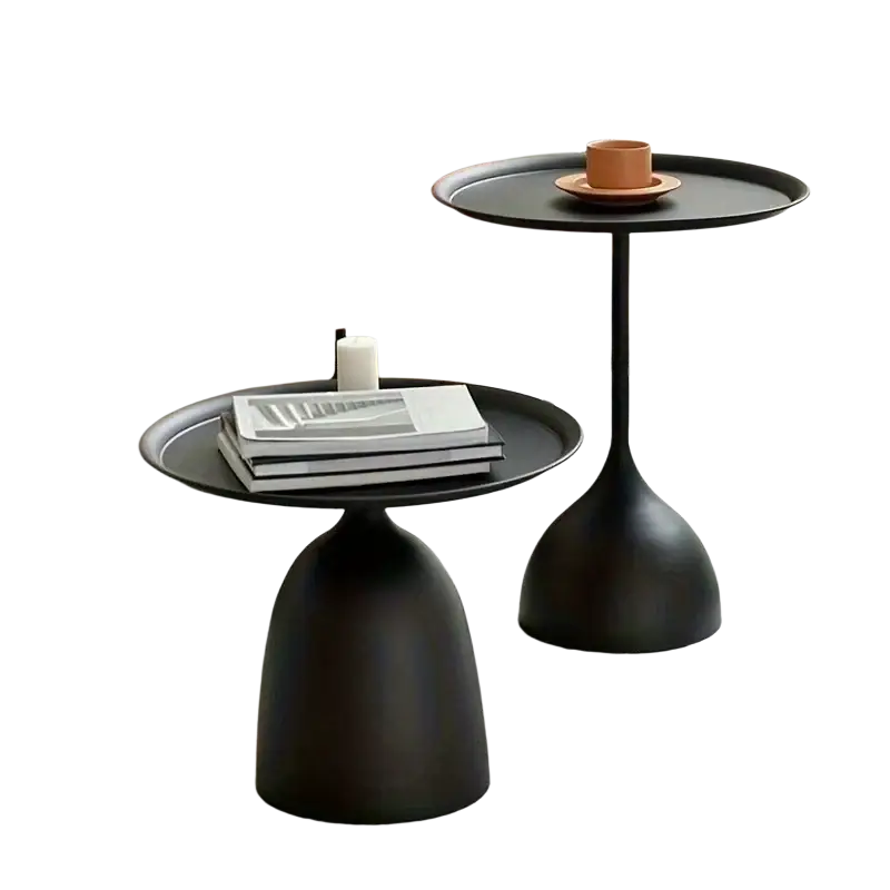 Black matte finished modern coffee table with sleek bulbous bases and round tops for living room use