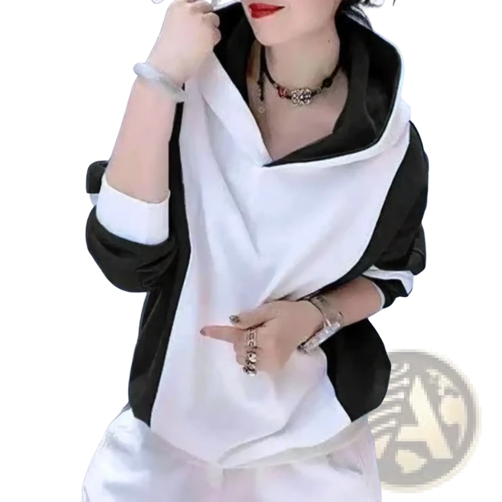 Black and white color block hooded sweatshirt with contrasting trim made of loose cotton pullover fabric