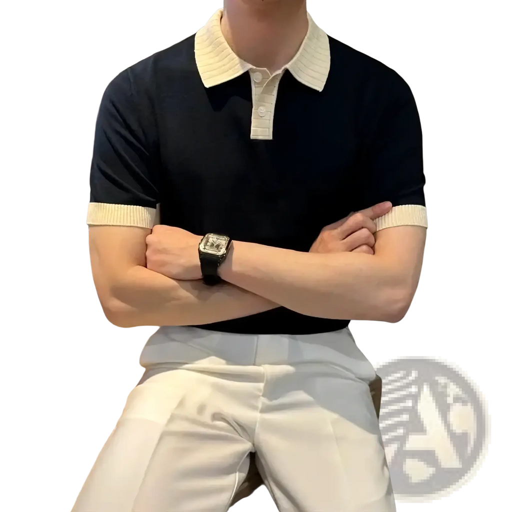 Navy blue color block knit polo shirt with cream ribbed collar and sleeve cuffs made of soft knit fabric