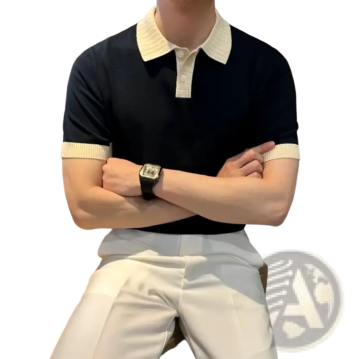 Navy blue color block knit polo shirt with cream ribbed collar and sleeve cuffs made of soft knit fabric