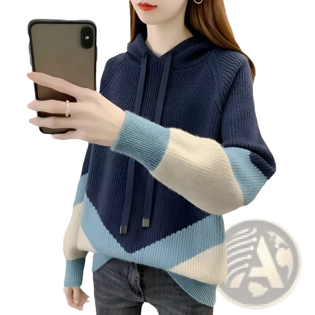 A cozy navy blue and light blue colorblock knit hoodie for women with ribbed cuffs and an asymmetrical hem