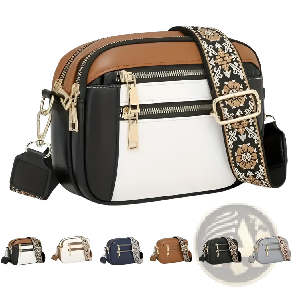 Colorblock leather crossbody camera bag in black white and brown with a decorative floral-patterned strap