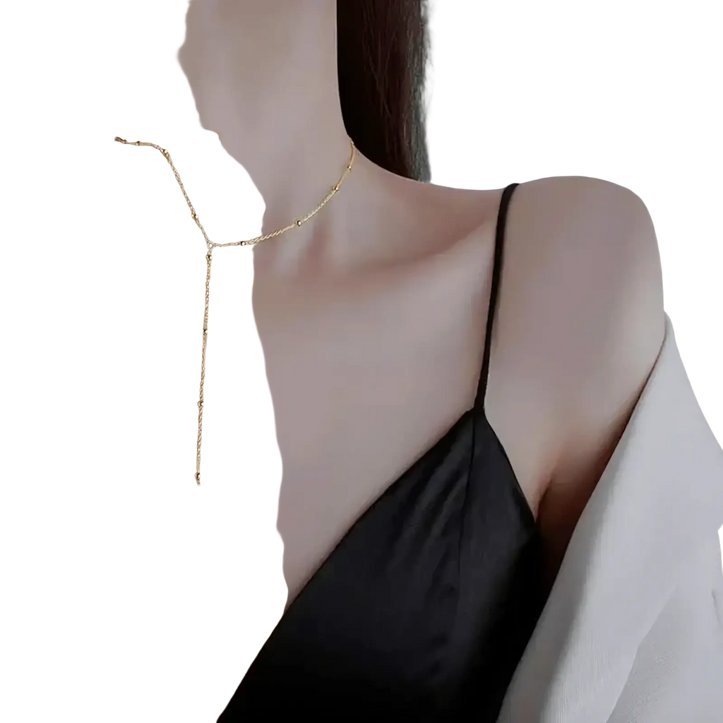 Delicate gold chain colorful crystal tassel statement necklace with slender beaded design and long dangling strand