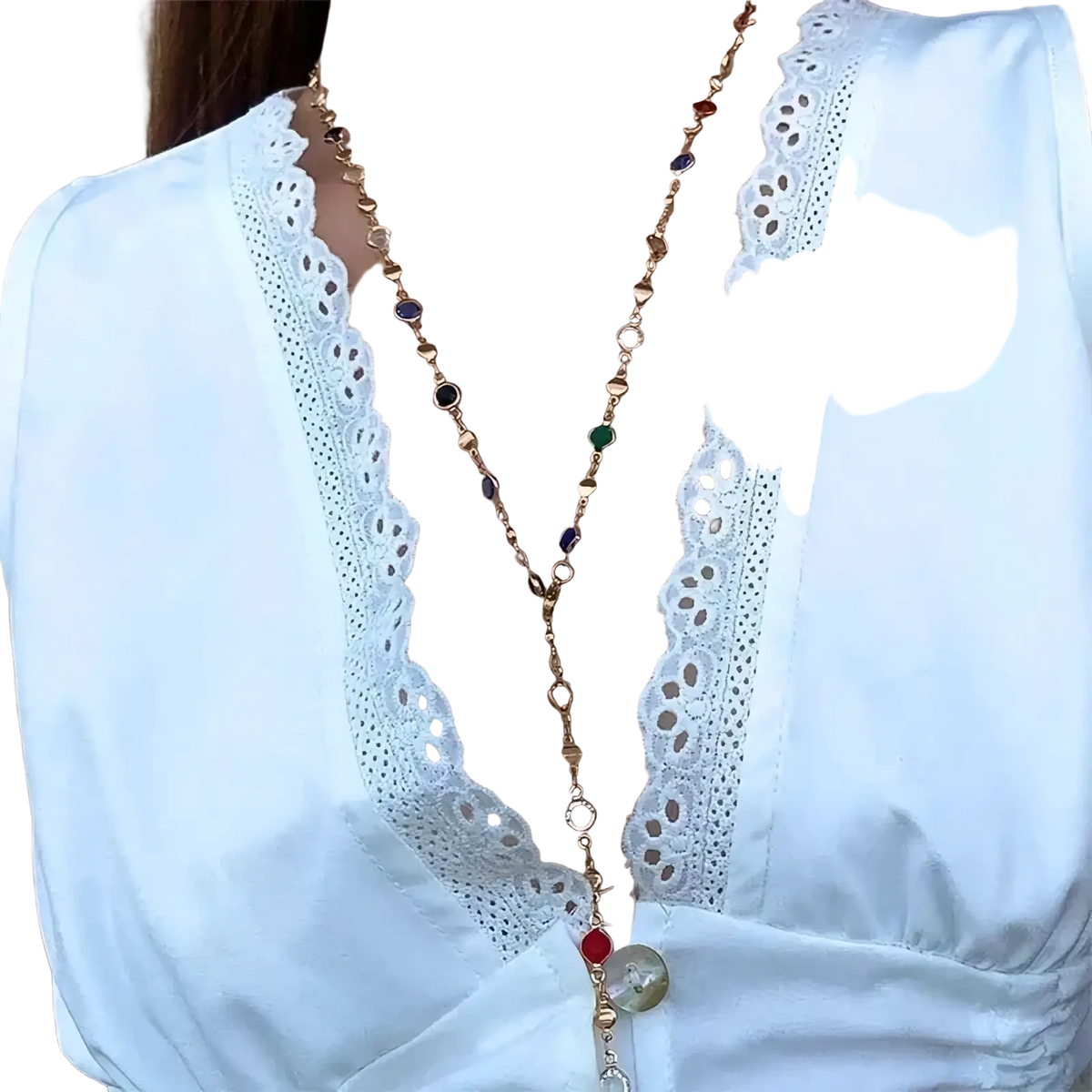 A delicate gold-toned colorful crystal tassel statement necklace with multicolored gemstones and a red green pendant