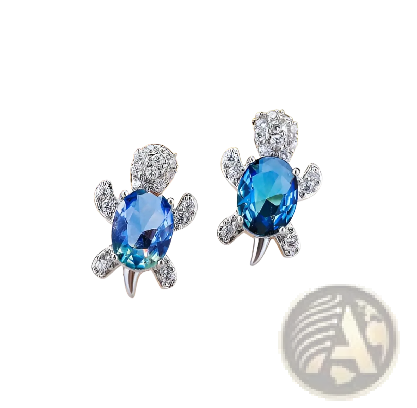 A pair of silver colorful crystal turtle stud earrings with vibrant blue oval shells and clear crystal accents