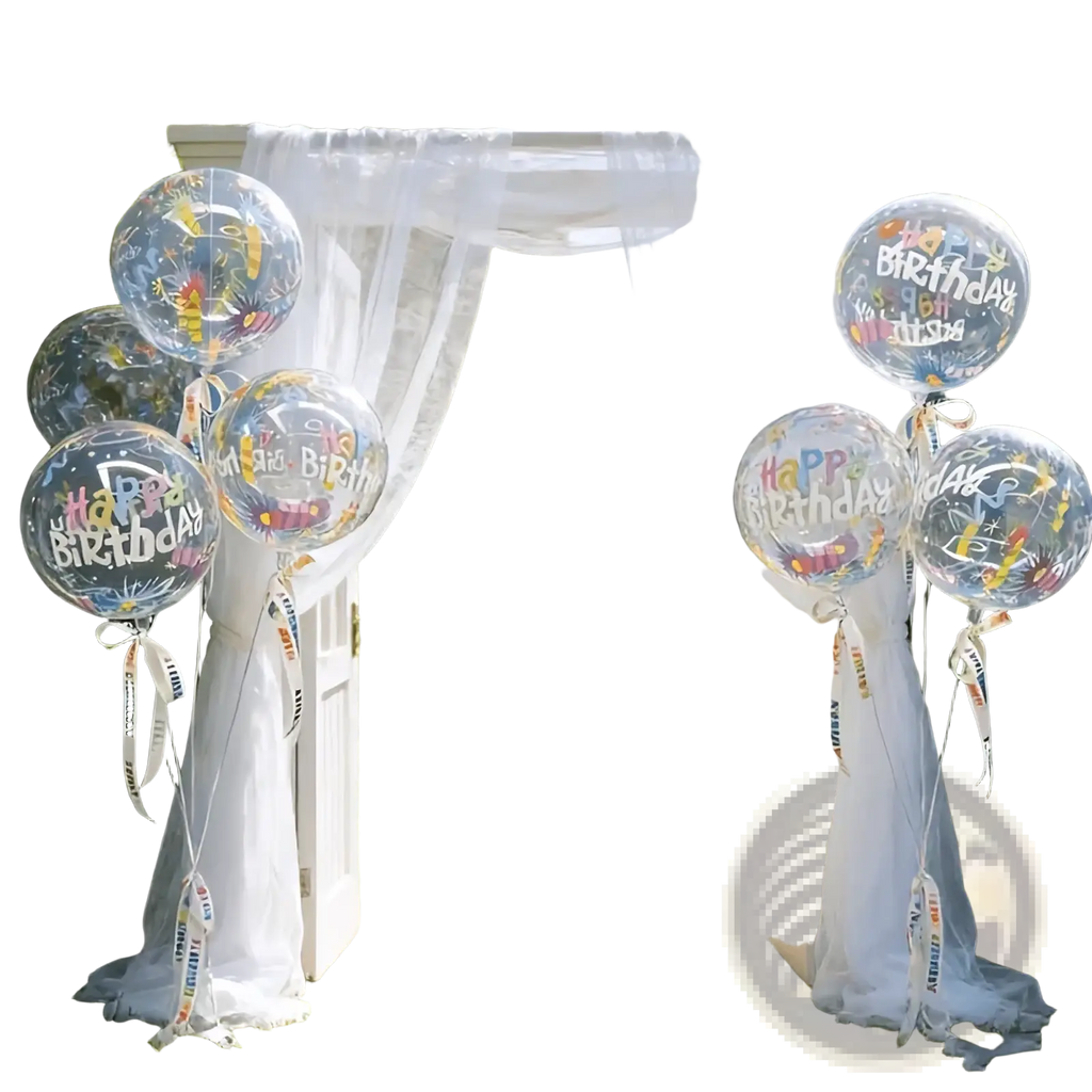 Clear colorful happy birthday bobo balloons with confetti designs and white ribbons for festive birthday decor