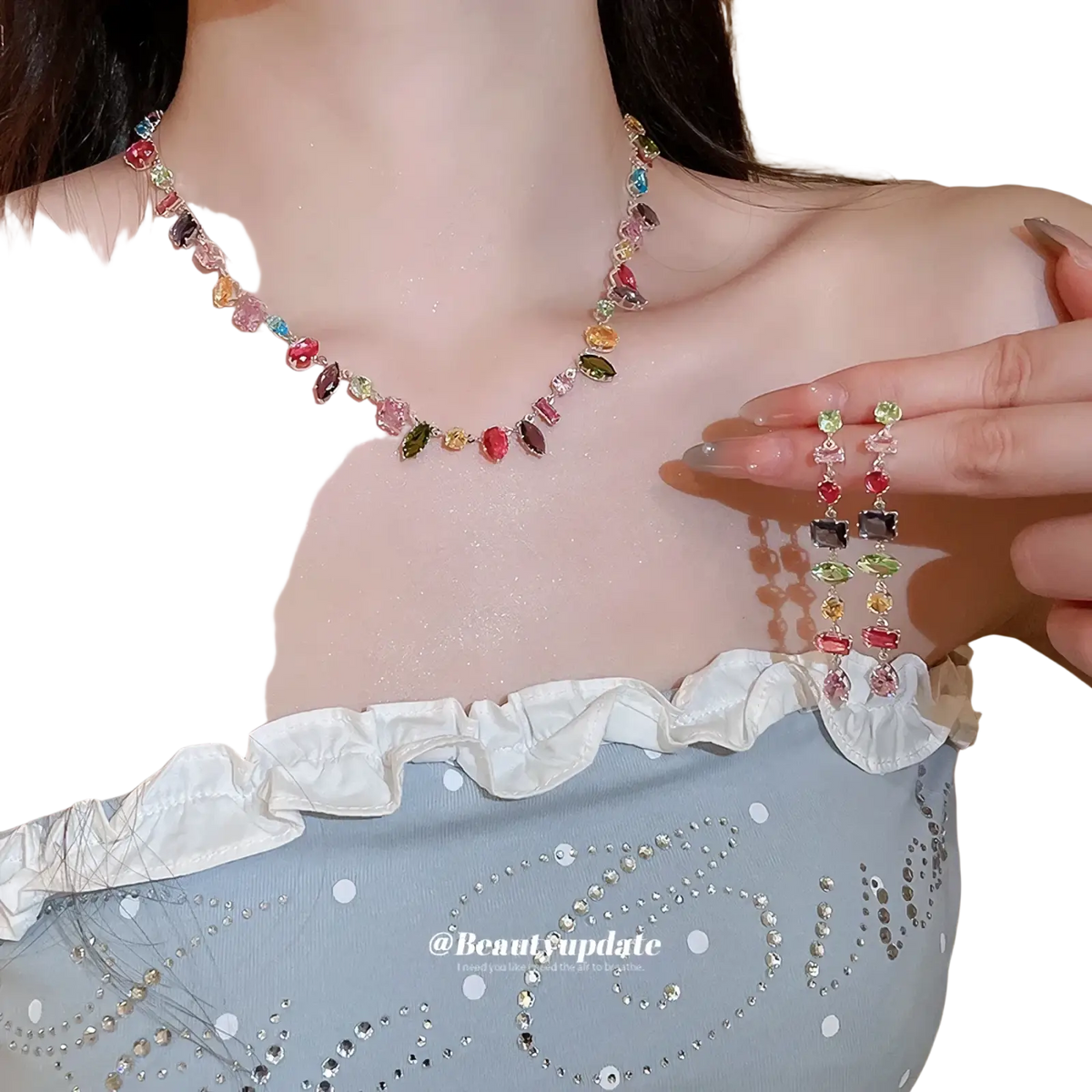 A colorful zircon crystal gold plated necklace with vibrant multicolored faceted gemstones on a slender chain