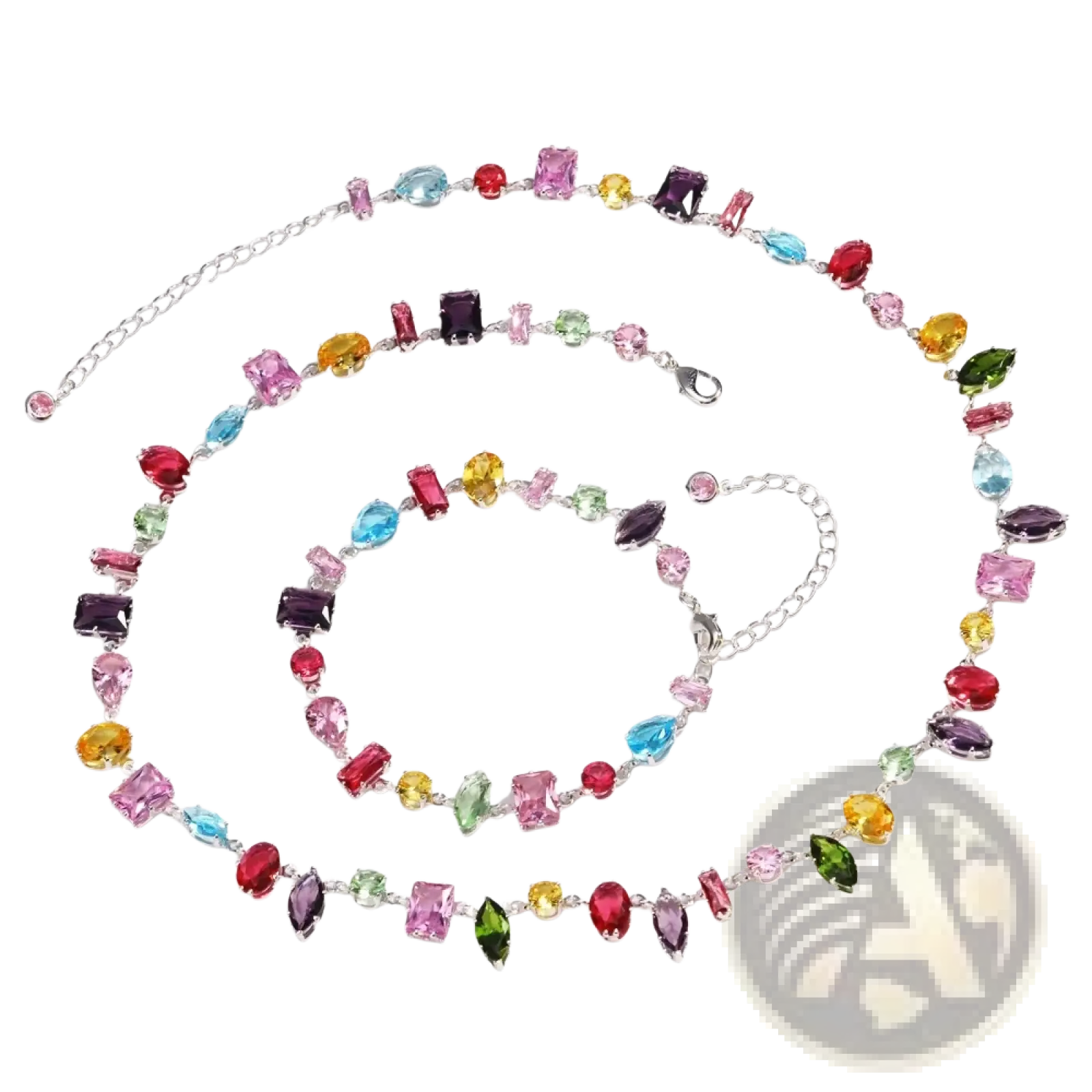 A colorful zircon crystal gold plated necklace with a silver chain and multicolored rectangular, oval, and marquise stones