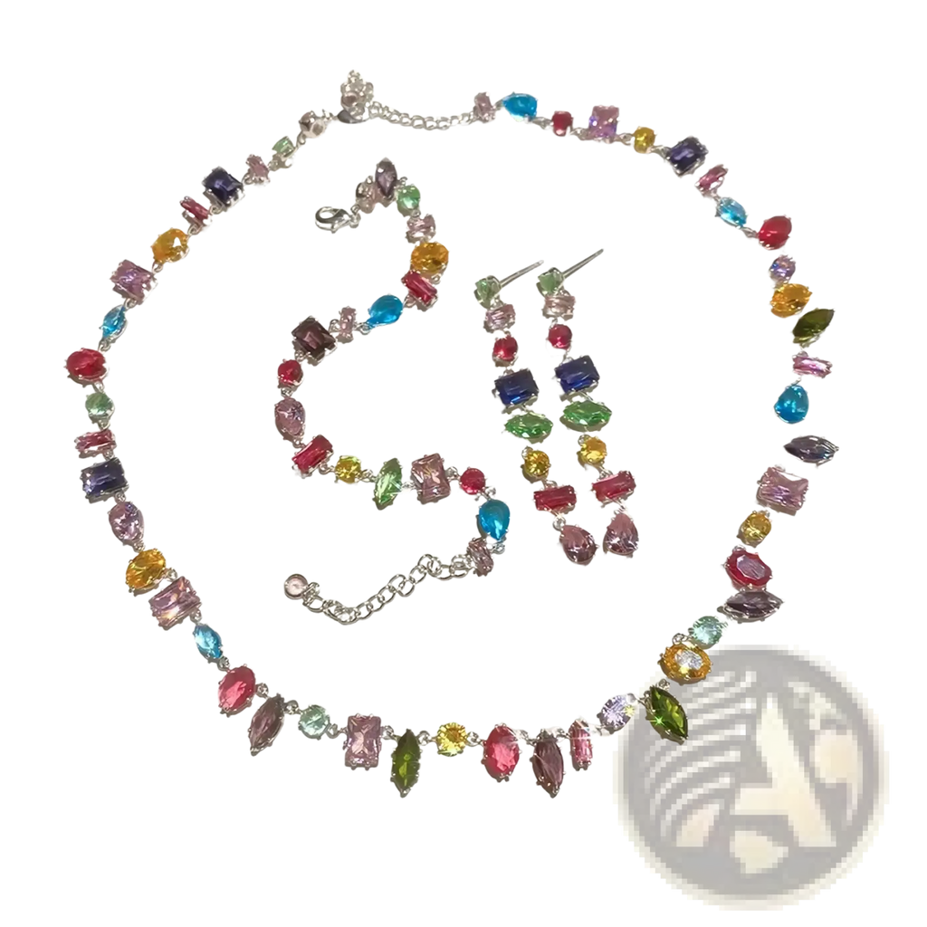 A colorful zircon crystal gold plated necklace with rainbow rectangular and teardrop gemstones and matching earrings
