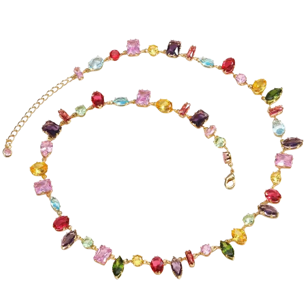 A vibrant gold-toned necklace adorned with multicolored zircon crystals in various cuts and shapes