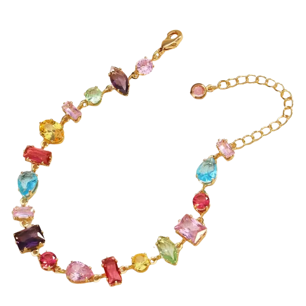 A vibrant gold-plated bracelet with colorful faceted zircon crystals in various shapes and hues