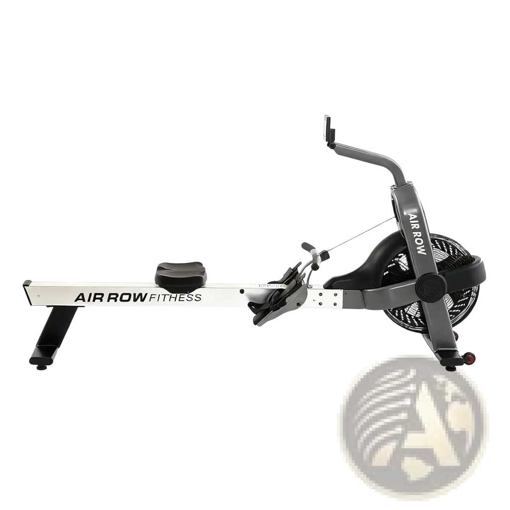 Commercial air rower fitness machine in gray and black with adjustable seat foot straps and large rear fan for air resistance