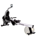 Commercial air rower fitness machine in silver and black with digital display for intense cardio workouts