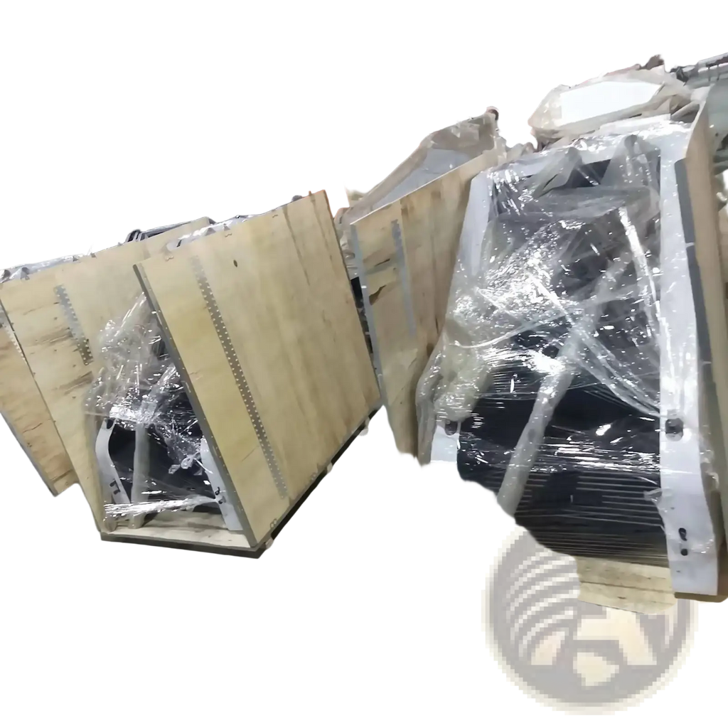 Black and white industrial fans wrapped in plastic inside wooden crates for commercial stair climber machine cardio stepmill