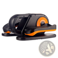 Compact under desk electric elliptical trainer in black and orange with textured foot pedals and circular resistance wheel