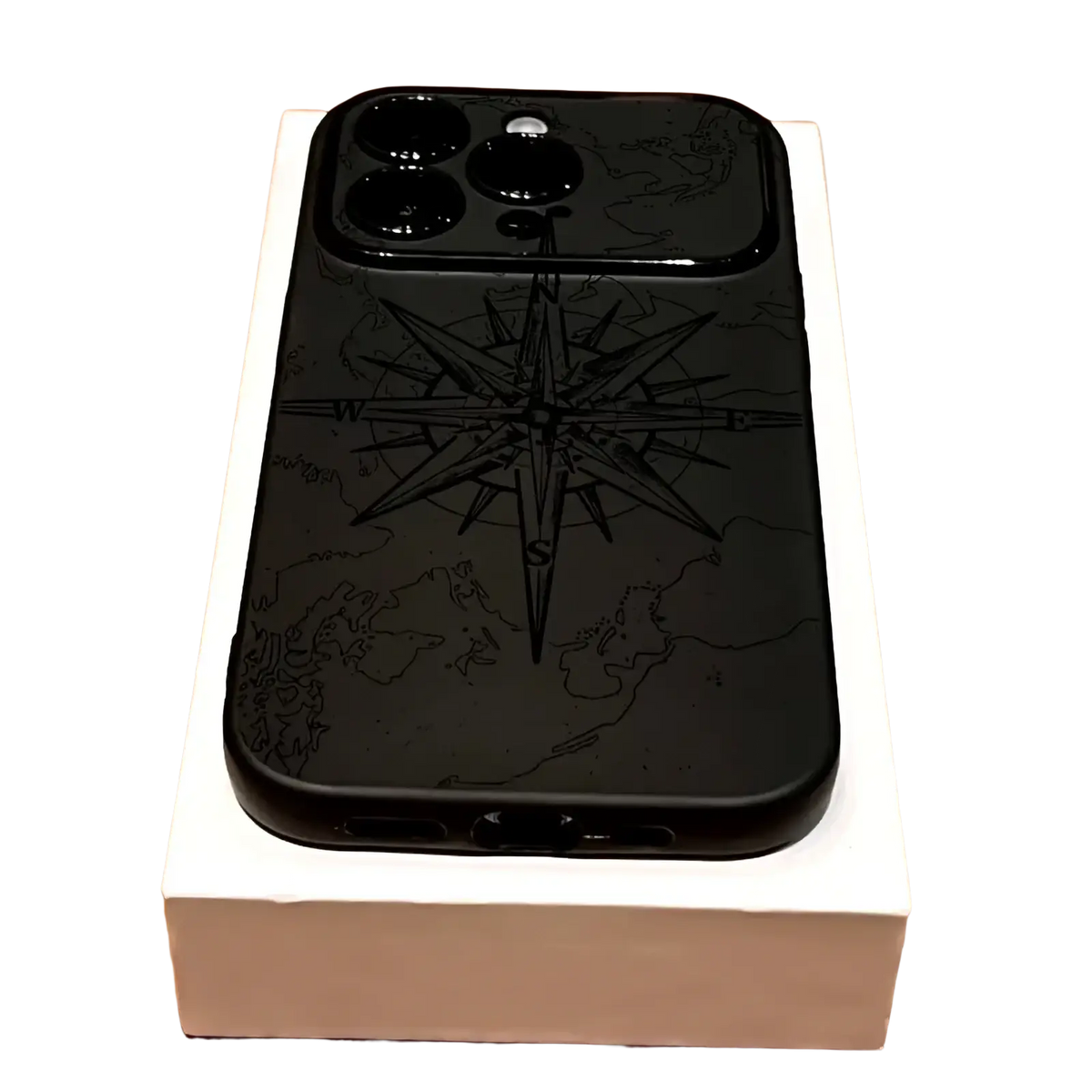 Back side of a black shockproof matte iphone case with an engraved compass rose over a world map design