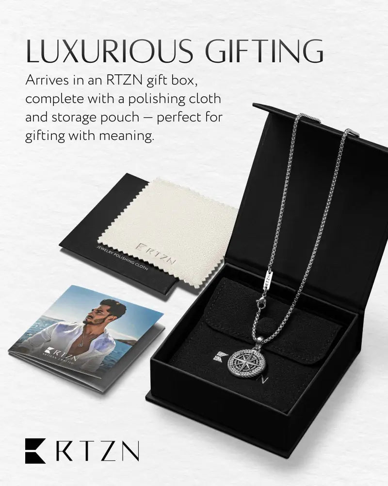 Silver compass locket necklace in stainless steel with a sleek modern design and a compass-style pendant