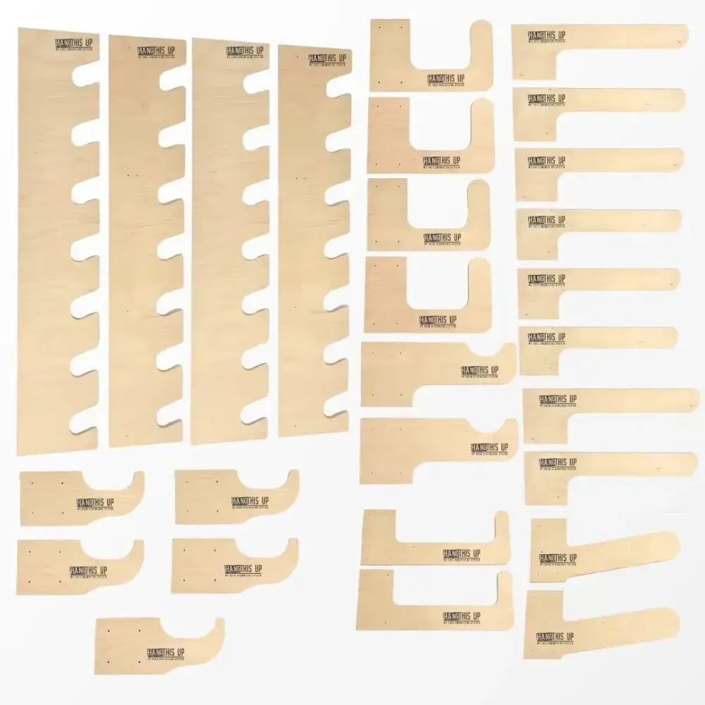 Light-colored wooden drawer organizer inserts with danger’s up logo for stud mounted garden tool wall organizer kit