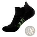 Black nylon compression athletic sock with neon green side stripes designed for soccer footwear use