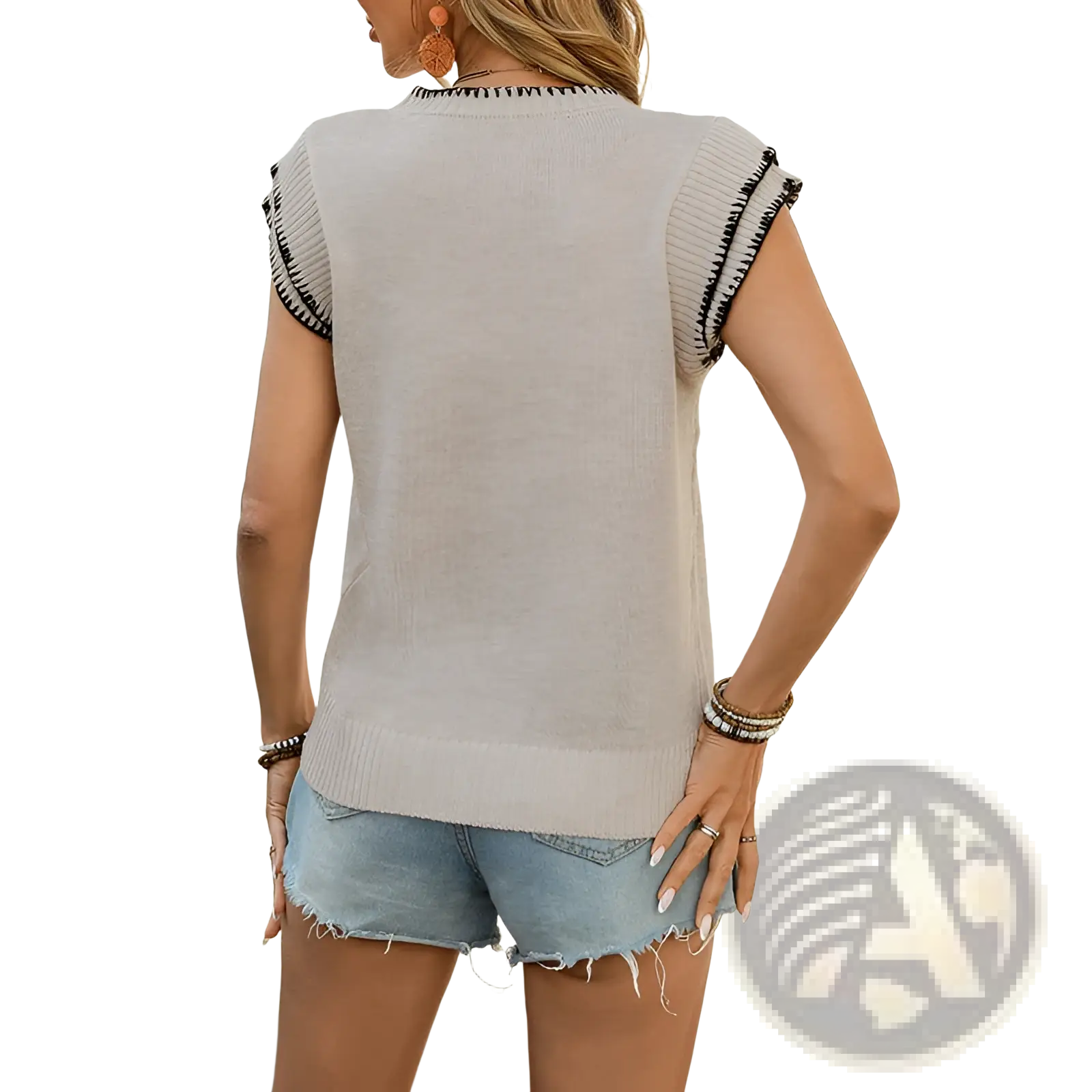 Beige sleeveless knit top with black contrast trim along shoulders and neckline for stylish casual wear