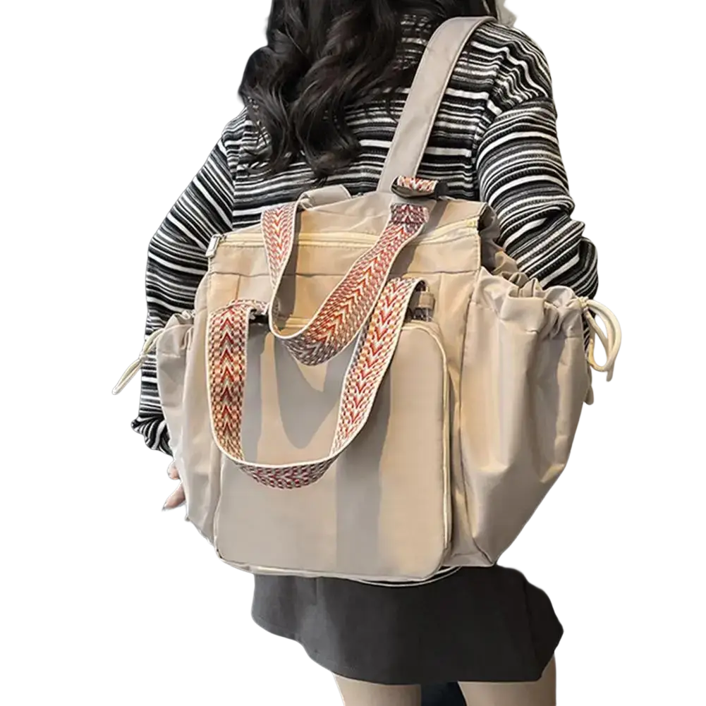 Beige canvas convertible tote backpack with woven red and beige straps large capacity nylon bag