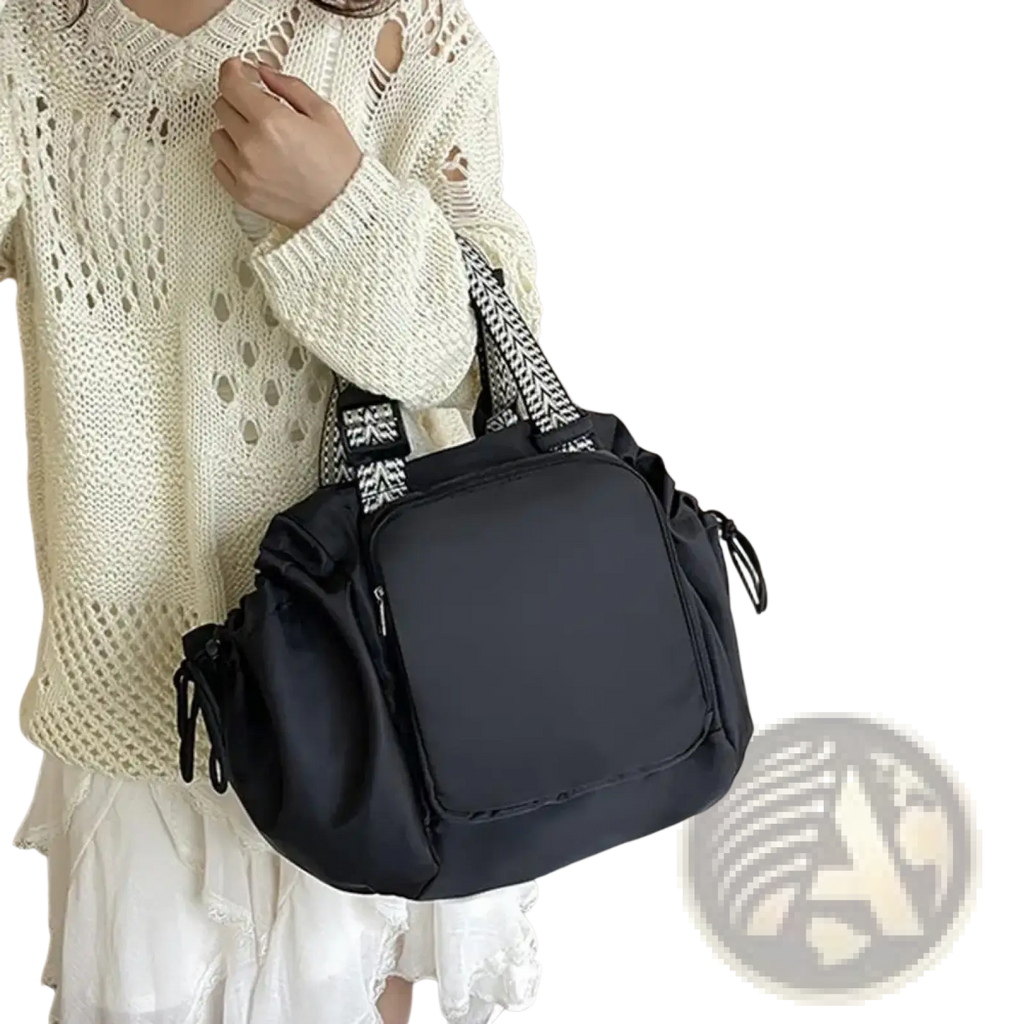 Black nylon convertible tote backpack with patterned straps and drawstring closures for large capacity use